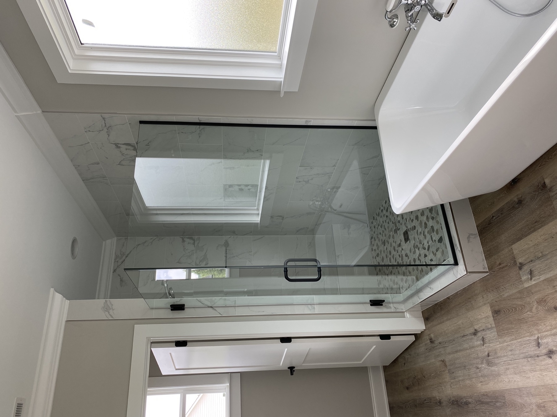 Master bath · shower, pebble floor & freestanding tub